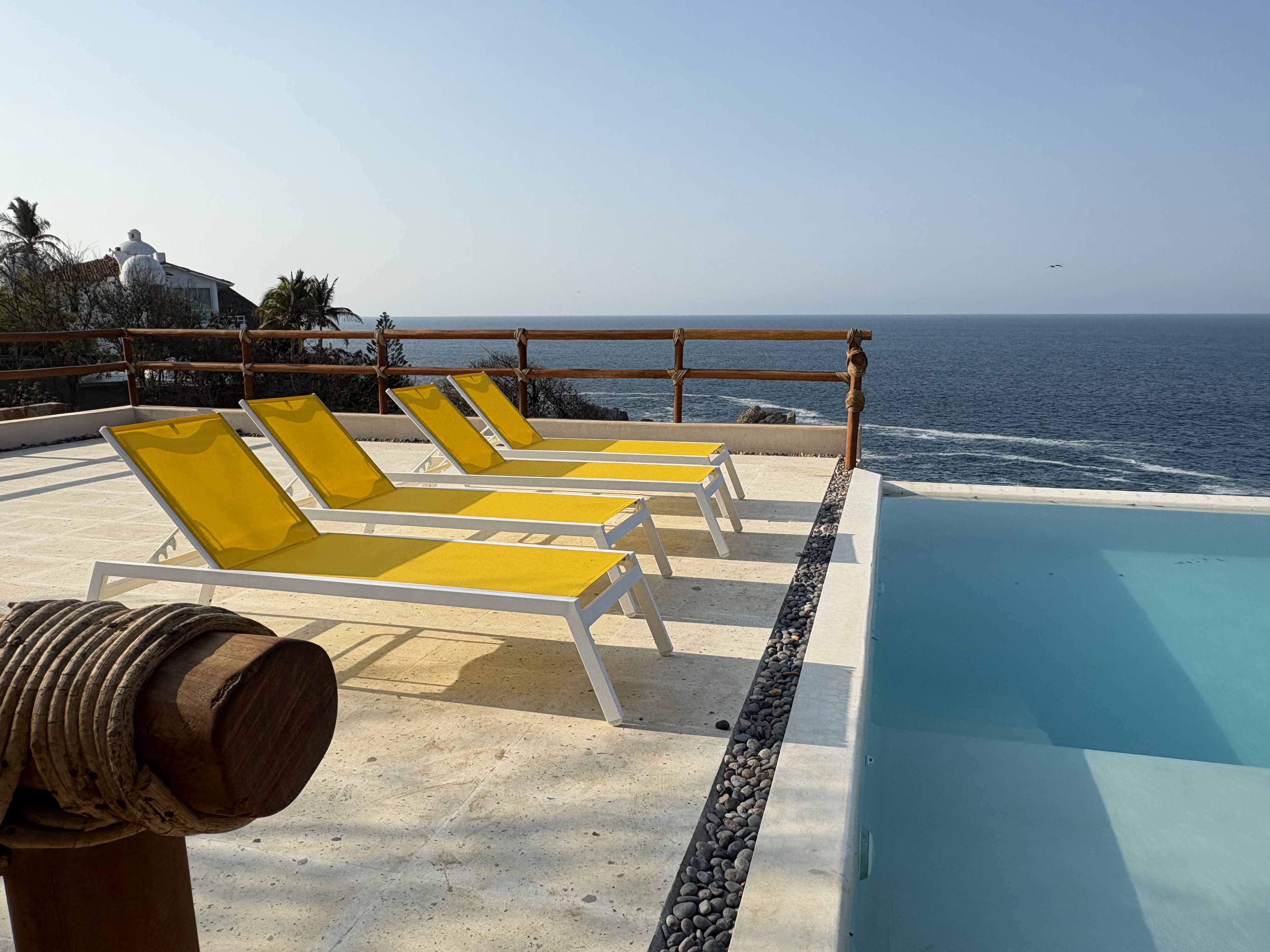 Pool deck with lounge chairs